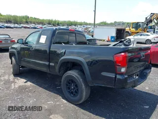 2019 Toyota Tacoma SR with VIN 5TFSX5EN7KX070319, listed as a IAAI auction lot 42475609 with 62,029 mi miles and . Bid and sale history available at DreamBid. Image 3.