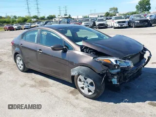 2018 Kia Forte LX with VIN 3KPFK4A70JE217385, listed as a IAAI auction lot 39955381 with 99,060 mi miles. Bid and sale history available at carsss.com. Image 1.