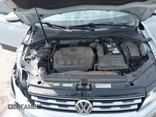 2018 Volkswagen Tiguan S with VIN 3VV1B7AX0JM092116, listed as a IAAI auction lot 42388339 with 103,412 mi miles and . Bid and sale history available at DreamBid. Image 10.