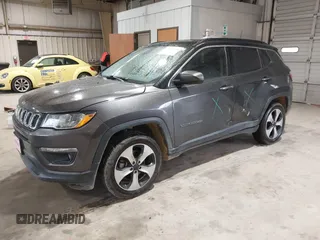 2018 Jeep Compass Latitude with VIN 3C4NJDBB9JT116391, listed as a IAAI auction lot 41953729 with 129,331 mi miles and . Bid and sale history available at DreamBid. Image 17.