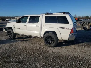 2015 Toyota Tacoma with VIN 5TFLU4EN9FX127195, listed as a Copart auction lot 41860035 with 127,078 mi miles and Salvage Title. Bid and sale history available at DreamBid. Image 2.