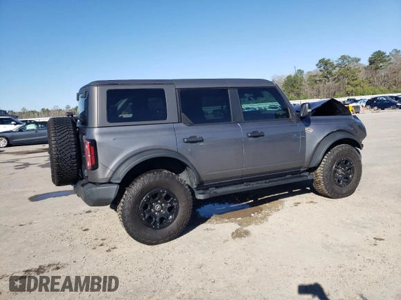 2023 Ford Bronco z VIN 1FMEE5DP0PLB62405, wystawiony jako Copart lot #48457335 z przebiegiem 56 998 mil mil oraz Szkoda całkowita • Salvage title. Historia ofert i sprzedaży dostępna na DreamBid. Obrazek 3.