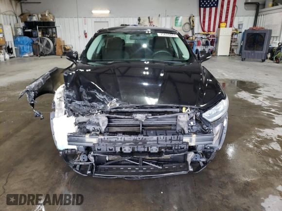 2015 Ford Fusion SE with VIN 3FA6P0H74FR153504, listed as a Copart auction lot 75628024 with 206,721 mi miles and Salvage Title. Bid and sale history available at carsss.com. Image 5.