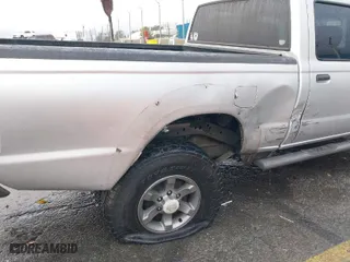 2004 Nissan Frontier 2WD XE with VIN 1N6ED29X04C423328, listed as a IAAI auction lot 41514717 with 297,128 mi miles. Bid and sale history available at carsss.com. Image 6.