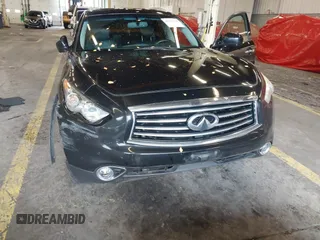 2016 Infiniti QX70 z VIN JN8CS1MW7GM400558, wystawiony jako IAAI lot #40917829 z przebiegiem 149 885 mil mil oraz . Historia ofert i sprzedaży dostępna na DreamBid. Obrazek 6.