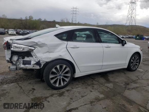 2020 Ford Fusion SE z VIN 3FA6P0T9XLR138977, wystawiony jako Copart lot #55260085 z przebiegiem 92 470 mil mil oraz Szkoda całkowita • Salvage title. Historia ofert i sprzedaży dostępna na DreamBid. Obrazek 3.