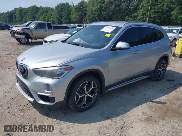 2018 BMW X1 xDrive28i with VIN WBXHT3C39J5L27926, listed as a IAAI auction lot 42582330 with 101,197 mi miles and . Bid and sale history available at DreamBid. Image 17.