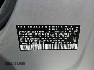 2012 Volkswagen Jetta TDI w/Premium & Nav z VIN 3VWLL7AJ9CM069918, wystawiony jako Copart lot #58237365 z przebiegiem 107 890 mil mil oraz Szkoda całkowita • Salvage title. Historia ofert i sprzedaży dostępna na DreamBid. Obrazek 12.