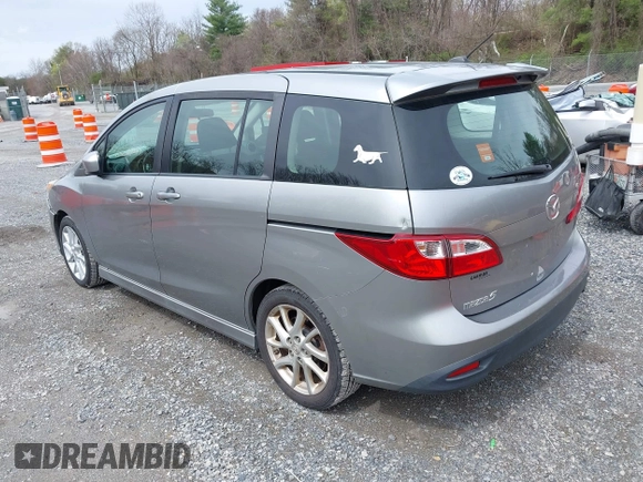 2012 Mazda 5 Touring with VIN JM1CW2CLXC0100740, listed as a IAAI auction lot 41918794 with 234,102 mi miles and . Bid and sale history available at DreamBid. Image 3.