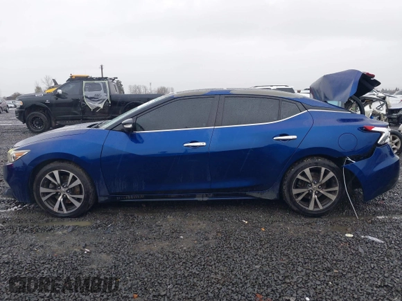 2016 Nissan Maxima SL with VIN 1N4AA6APXGC396890, listed as a IAAI auction lot 41594044 with 144,164 mi miles and . Bid and sale history available at DreamBid. Image 14.