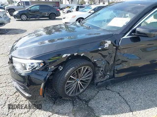 2018 BMW 5 Series 530i with VIN WBAJA5C56JG897692, listed as a IAAI auction lot 41813052 with 37,610 mi miles and . Bid and sale history available at DreamBid. Image 6.