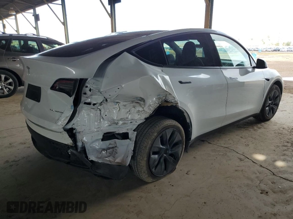 2024 Tesla Model Y Long Range with VIN 7SAYGDEE1RF165311, listed as a Copart auction lot 51711665 with 15,190 mi miles and Salvage Title. Bid and sale history available at DreamBid. Image 3.