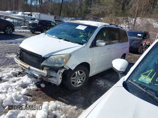 2007 Honda Odyssey EX-L with VIN 5FNRL38637B127782, listed as a IAAI auction lot 41590102 with 194,590 mi miles and . Bid and sale history available at DreamBid. Image 2.