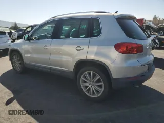 2012 Volkswagen Tiguan SEL with VIN WVGAV7AXXCW521394, listed as a Copart auction lot 53000555 with 126,017 mi miles and Salvage Title. Bid and sale history available at DreamBid. Image 2.