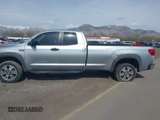 2012 Toyota Tundra 4WD Truck SR with VIN 5TFCW5F19CX012832, listed as a IAAI auction lot 41726453 with 232,078 mi miles. Bid and sale history available at carsss.com. Image 14.