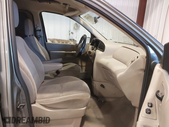 2003 Ford Windstar SE with VIN 2FMZA52413BB09700, listed as a IAAI auction lot 41037056 with 179,486 mi miles and . Bid and sale history available at DreamBid. Image 5.
