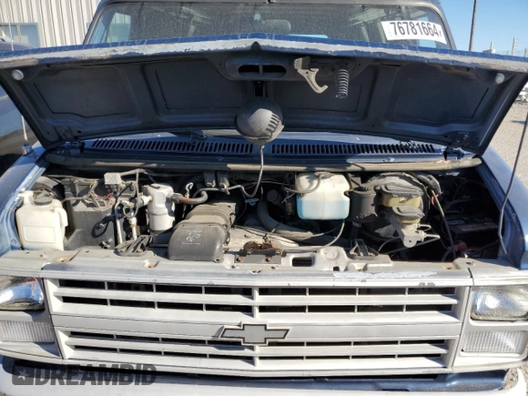 1988 Chevrolet Chevy Van z VIN 1GCEG25H5J7124768, wystawiony jako Copart lot #76781664 z przebiegiem 86 588 mil mil oraz Tytuł czysty. Historia ofert i sprzedaży dostępna na DreamBid. Obrazek 12.
