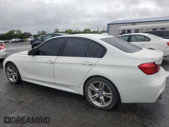 2014 BMW 3 Series 335i xDrive with VIN WBA3B9G51ENR92301, listed as a Copart auction lot 58296885 with 81,988 mi miles and Salvage title. Bid and sale history available at DreamBid. Image 2.