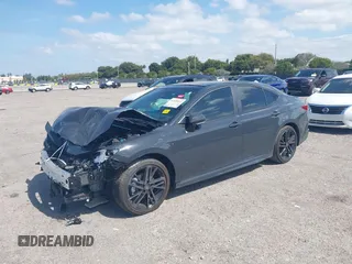 2025 Toyota Camry LE with VIN 4T1DAACK5SU076886, listed as a IAAI auction lot 41629641 with 9,919 mi miles and . Bid and sale history available at DreamBid. Image 18.