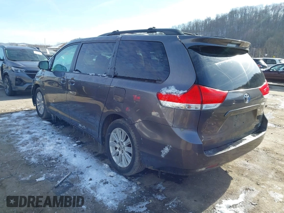 2013 Toyota Sienna LE with VIN 5TDJK3DC8DS056730, listed as a IAAI auction lot 41141247 with 166,579 mi miles and . Bid and sale history available at DreamBid. Image 3.