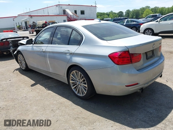 2013 BMW 3 Series 335i with VIN WBA3A9C55DF475648, listed as a IAAI auction lot 42310502 with 151,823 mi miles and . Bid and sale history available at DreamBid. Image 3.