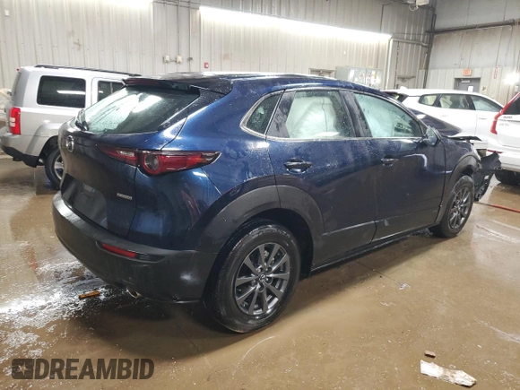 2023 Mazda CX-30 S with VIN 3MVDMBAM1PM565897, listed as a Copart auction lot 52426115 with 19,648 mi miles and Salvage title. Bid and sale history available at DreamBid. Image 3.
