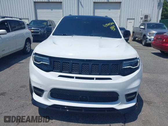 2019 Jeep Grand Cherokee Summit with VIN 1C4RJFJT1KC785744, listed as a IAAI auction lot 42645006 with 38,483 mi miles and . Bid and sale history available at DreamBid. Image 12.