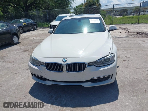2014 BMW 3 Series 328i with VIN WBA3A5C54EP600398, listed as a IAAI auction lot 42665302 with 117,012 mi miles and . Bid and sale history available at DreamBid. Image 12.