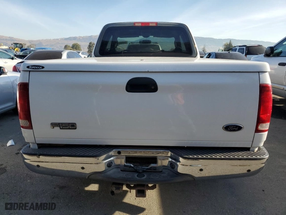 2003 Ford F-150 Work Series with VIN 2FTRX17WX3CA63767, listed as a Copart auction lot 84299684 with 165,719 mi miles and Salvage Title. Bid and sale history available at carsss.com. Image 6.