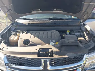 2018 Dodge Journey SE with VIN 3C4PDDAG9JT189824, listed as a IAAI auction lot 42208115 with 97,035 mi miles and . Bid and sale history available at DreamBid. Image 10.