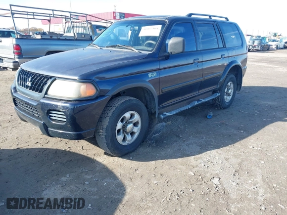 2002 Mitsubishi Montero ES z VIN JA4LS21H72J054989, wystawiony jako IAAI lot #41067504 z przebiegiem 335 479 mil mil oraz . Historia ofert i sprzedaży dostępna na DreamBid. Obrazek 2.