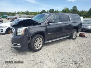 2015 GMC Yukon XL SLE z VIN 1GKS1GKC2FR625157, wystawiony jako Copart lot #69628124 z przebiegiem 153 022 mil mil oraz Szkoda całkowita • Salvage title. Historia ofert i sprzedaży dostępna na DreamBid. Obrazek 1.
