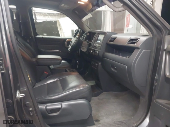 2011 Honda Ridgeline RTL with VIN 5FPYK1F57BB004189, listed as a IAAI auction lot 41871741 with 193,913 mi miles. Bid and sale history available at carsss.com. Image 5.