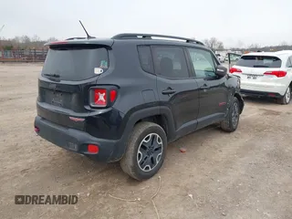 2017 Jeep Renegade Trailhawk z VIN ZACCJBCB9HPG55038, wystawiony jako IAAI lot #41737043 z przebiegiem 103 488 mil mil oraz . Historia ofert i sprzedaży dostępna na DreamBid. Obrazek 4.
