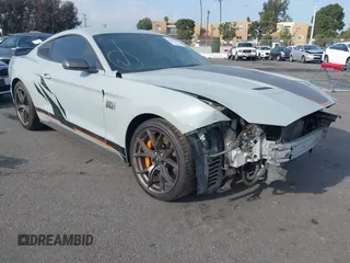 2023 Ford Mustang Mach 1 with VIN 1FA6P8R02P5502244, listed as a IAAI auction lot 41409445 with 12,573 mi miles and . Bid and sale history available at DreamBid. Image 1.