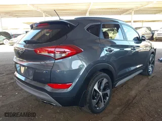 2017 Hyundai Tucson Value with VIN KM8J33A27HU460429, listed as a IAAI auction lot 41681076 with 95,178 mi miles. Bid and sale history available at carsss.com. Image 4.