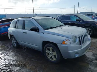 2008 Jeep Compass Sport with VIN 1J8FF47W58D703312, listed as a IAAI auction lot 41693818 with 156,161 mi miles. Bid and sale history available at carsss.com. Image 1.