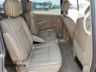 2014 Nissan Quest SV z VIN JN8AE2KP0E9101509, wystawiony jako Copart lot #58003325 z przebiegiem 198 287 mil mil oraz Tytuł czysty. Historia ofert i sprzedaży dostępna na DreamBid. Obrazek 11.