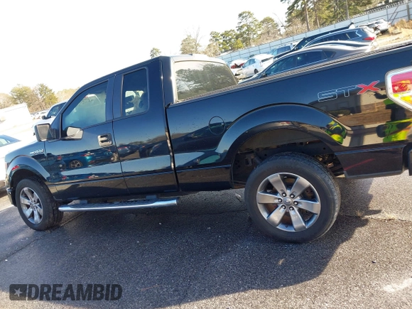 2009 Ford F-150 STX with VIN 1FTRX12WX9FA69251, listed as a IAAI auction lot 41341658 with 169,074 mi miles. Bid and sale history available at carsss.com. Image 14.