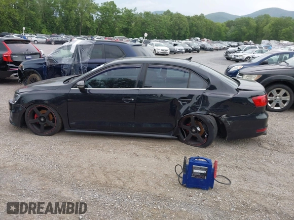 2012 Volkswagen Jetta GLI Autobahn with VIN 3VW4A7AJ3CM393831, listed as a IAAI auction lot 42292910 with 162,611 mi miles and . Bid and sale history available at DreamBid. Image 14.