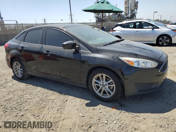 2018 Ford Focus SE z VIN 1FADP3FE0JL293485, wystawiony jako Copart lot #61202625 z przebiegiem 91 025 mil mil oraz Szkoda całkowita • Salvage title. Historia ofert i sprzedaży dostępna na DreamBid. Obrazek 4.