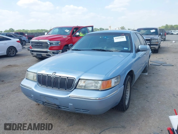 2000 Mercury Grand Marquis LS z VIN 2MEFM75W1YX673105, wystawiony jako IAAI lot #42050980 z przebiegiem 154 944 mil mil oraz . Historia ofert i sprzedaży dostępna na DreamBid. Obrazek 17.