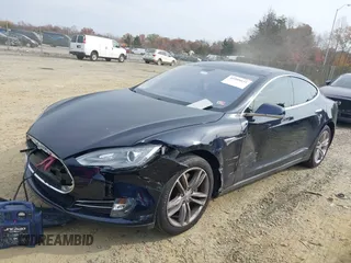 2014 Tesla Model S 60 with VIN 5YJSA1S12EFP42605, listed as a IAAI auction lot 40905031 with 68,155 mi miles and . Bid and sale history available at DreamBid. Image 19.