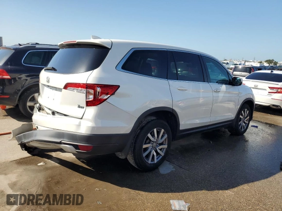 2021 Honda Pilot EX-L with VIN 5FNYF5H54MB045464, listed as a Copart auction lot 63412425 with 60,666 mi miles and Salvage title. Bid and sale history available at DreamBid. Image 3.