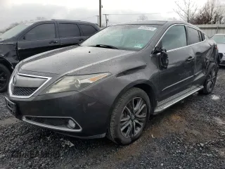 2010 Acura ZDX Tech Pkg with VIN 2HNYB1H47AH502067, listed as a Copart auction lot 82005414 with 105,274 mi miles and Salvage Title. Bid and sale history available at carsss.com. Image 1.