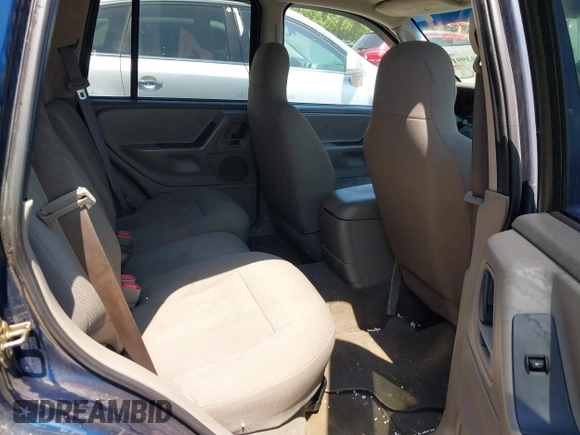 2003 Jeep Grand Cherokee Laredo with VIN 1J4GX48S83C548090, listed as a IAAI auction lot 42039918 with 243,209 mi miles. Bid and sale history available at carsss.com. Image 8.