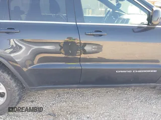 2014 Jeep Grand Cherokee Laredo with VIN 1C4RJEAG0EC442053, listed as a IAAI auction lot 42098601 with 200,982 mi miles and . Bid and sale history available at DreamBid. Image 13.