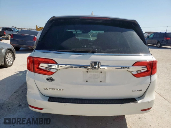 2018 Honda Odyssey Touring с VIN 5FNRL6H8XJB042111, выставлен на аукционе Copart как лот 52360005 с пробегом 126 835 миль миль и Чистый • Clean title. История ставок и продаж доступна на DreamBid. Изображение 6.