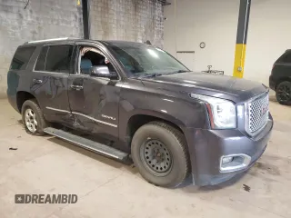 2015 GMC Yukon Denali with VIN 1GKS2CKJ2FR677604, listed as a Copart auction lot 51714505 with 146,648 mi miles and Salvage Title. Bid and sale history available at carsss.com. Image 4.