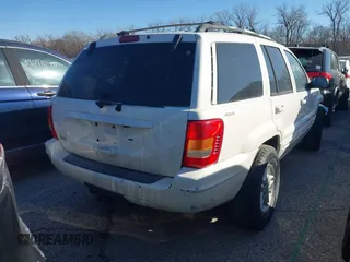 2000 Jeep Grand Cherokee Limited with VIN 1J4GW58N4YC271335, listed as a IAAI auction lot 41046412 with Not provided miles and . Bid and sale history available at DreamBid. Image 4.